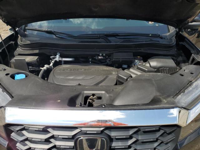 Photo 12 from auction – 2023 HONDA PASSPORT E with VIN 5FNYF8H58PB021500