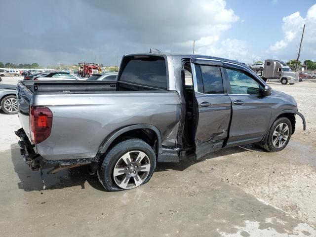 Photo 3 from auction – 2018 HONDA RIDGELINE with VIN 5FPYK3F56JB016036