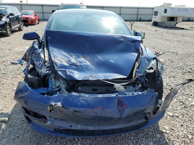 Photo 5 from auction – 2022 TESLA MODEL 3 with VIN 5YJ3E1EC5NF130193