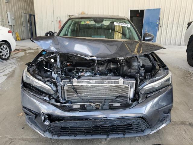 Photo 5 from auction – 2022 HONDA CIVIC EX with VIN JHMFE1F74NX007911