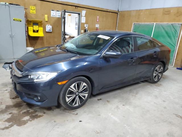 HONDA CIVIC EXL 2017 with VIN 19XFC1F74HE028365 - Photo from auction