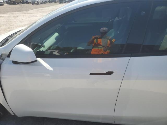 Photo 7 from auction – 2023 TESLA MODEL Y with VIN 7SAYGDEE8PF715519