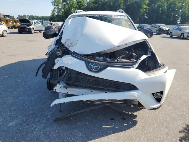Photo 5 from auction – 2018 TOYOTA RAV4 LE with VIN JTMZFREV4JJ182201