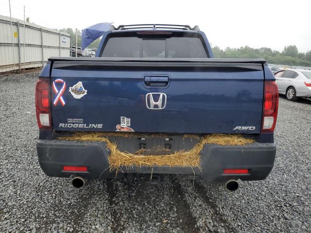 Photo 6 from auction – 2023 HONDA RIDGELINE with VIN 5FPYK3F54PB057029