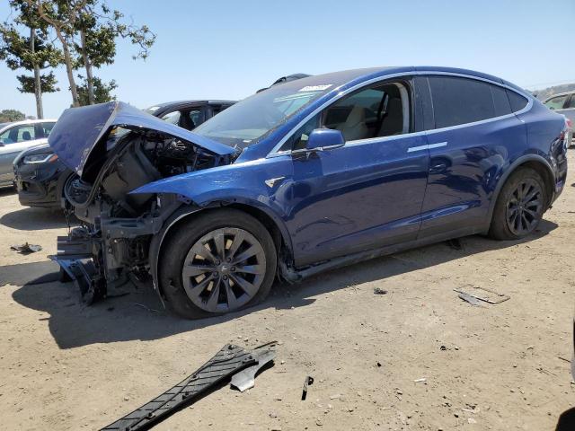 TESLA MODEL X 2018 with VIN 5YJXCDE22JF141792 - Photo from auction