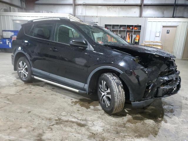 Photo 4 from auction – 2018 TOYOTA RAV4 LE with VIN 2T3BFREV0JW731394