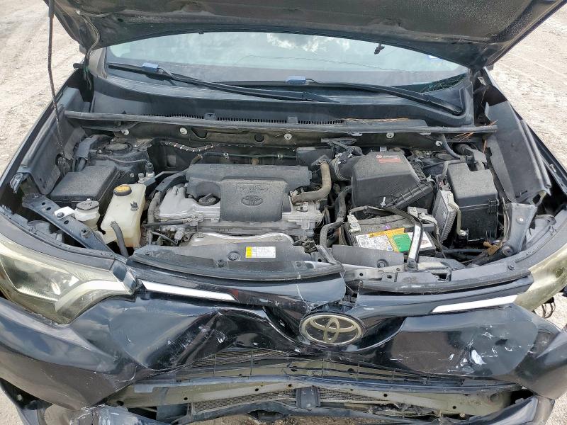 Photo 12 from auction – 2018 TOYOTA RAV4 LE with VIN 2T3ZFREV6JW491363