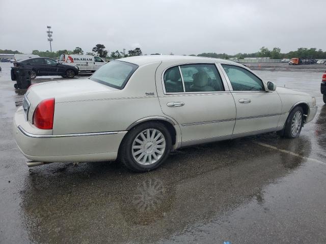 Photo 3 from auction – 2004 LINCOLN TOWN CAR U with VIN 1LNHM85W34Y606463