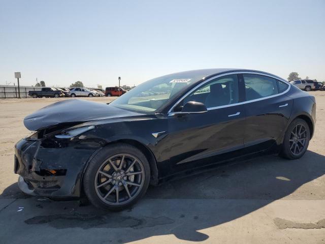 TESLA MODEL 3 2018 with VIN 5YJ3E1EB8JF084716 - Photo from auction