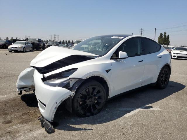 TESLA MODEL Y 2022 with VIN 7SAYGAEE7NF541230 - Photo from auction