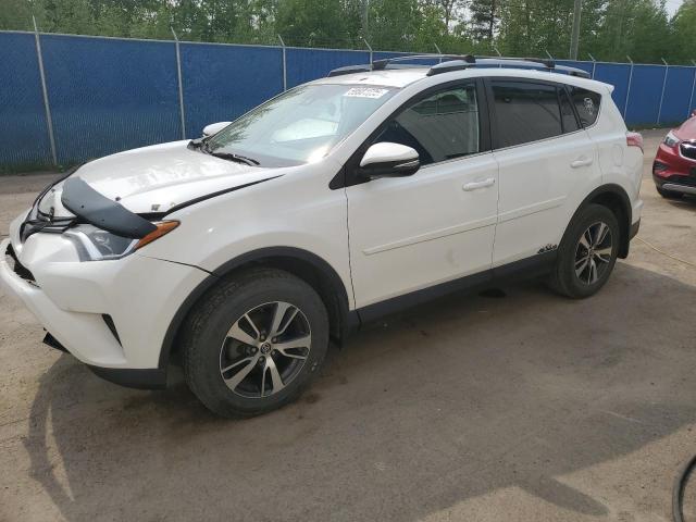 TOYOTA RAV4 LE 2018 with VIN 2T3ZFREV7JW504122 - Photo from auction