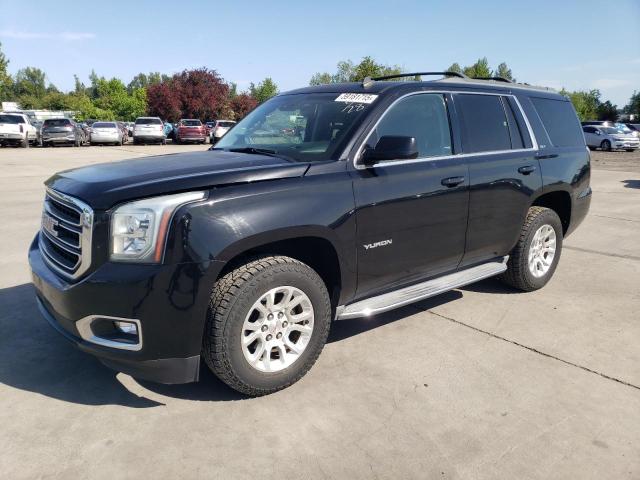 GMC YUKON SLT 2015 with VIN 1GKS2BKC4FR188875 - Photo from auction