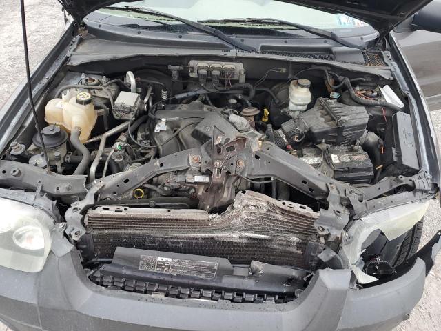 Photo 12 from auction – 2005 FORD ESCAPE XLT with VIN 1FMYU93135KD65313