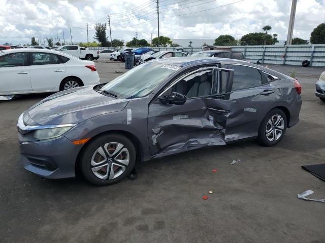 HONDA CIVIC LX 2018 with VIN 2HGFC2F51JH584889 - Photo from auction