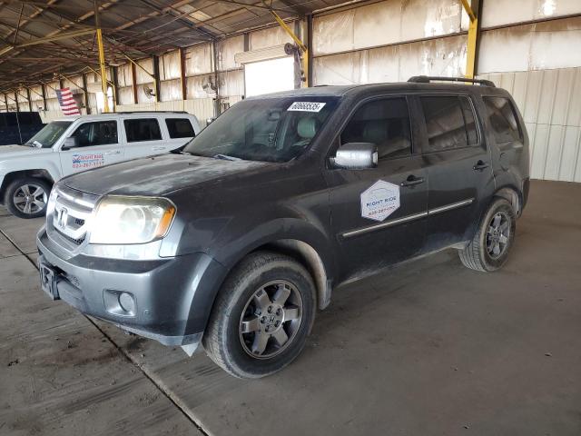 HOND PILOT TOURING 2011 with VIN 5FNYF3H94BB001999 - Photo from auction
