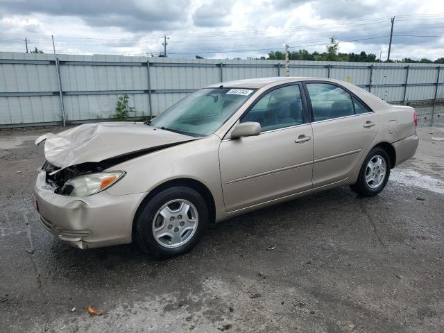 TOYOTA CAMRY LE 2002 with VIN 4T1BF32KX2U028080 - Photo from auction