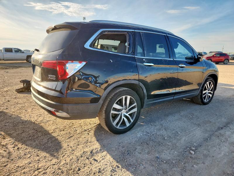 Photo 3 from auction – 2016 HONDA PILOT TOUR with VIN 5FNYF6H98GB123290