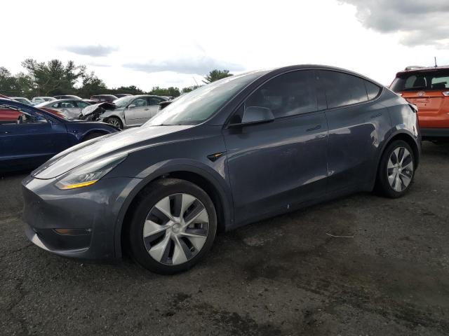 TESLA MODEL Y 2022 with VIN 7SAYGDEE6NF310613 - Photo from auction