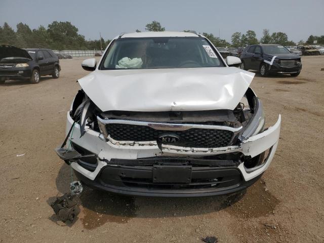 Photo 5 from auction – 2016 KIA SORENTO LX with VIN 5XYPG4A54GG149656