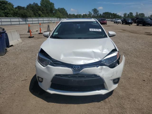 Photo 5 from auction – 2014 TOYOTA COROLLA EC with VIN 5YFBPRHE6EP085772