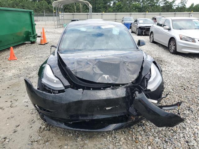 Photo 5 from auction – 2021 TESLA MODEL 3 with VIN 5YJ3E1ECXMF055781