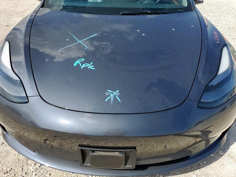 Photo 11 from auction – 2023 TESLA MODEL 3 with VIN 5YJ3E1EA8PF705825