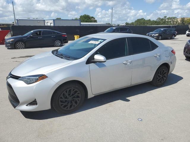 TOYOTA COROLLA L 2019 with VIN 2T1BURHEXKC191047 - Photo from auction