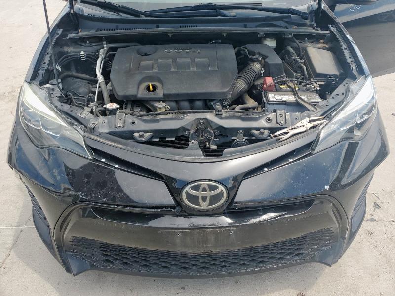 Photo 11 from auction – 2018 TOYOTA COROLLA L with VIN 5YFBURHEXJP811023