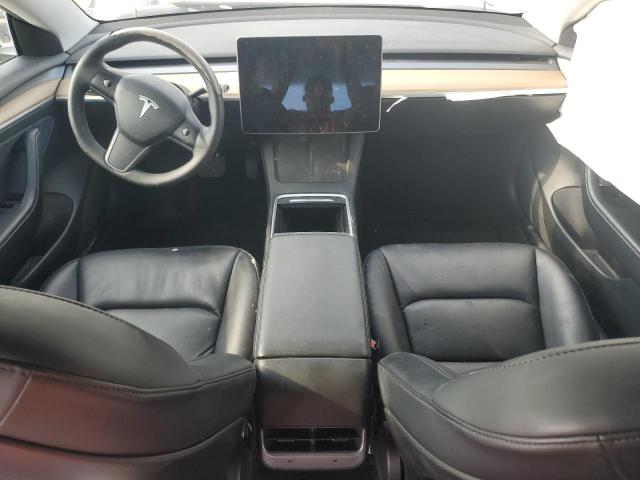 Photo 8 from auction – 2021 TESLA MODEL 3 with VIN 5YJ3E1EA2MF977475