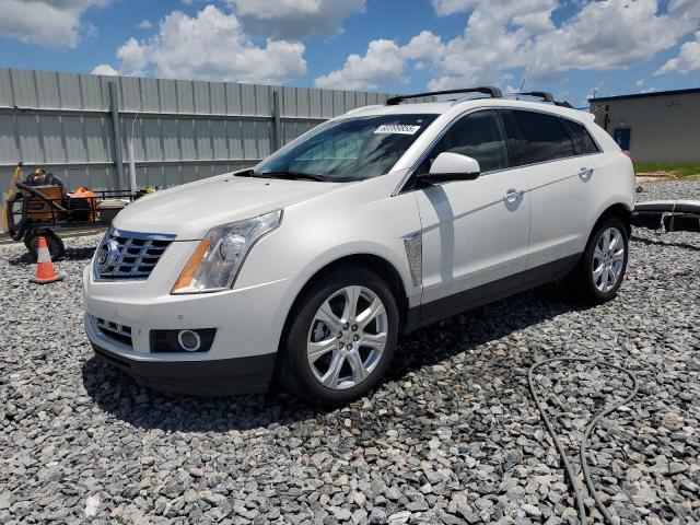 CADILLAC SRX PERFOR 2013 with VIN 3GYFNDE38DS631335 - Photo from auction
