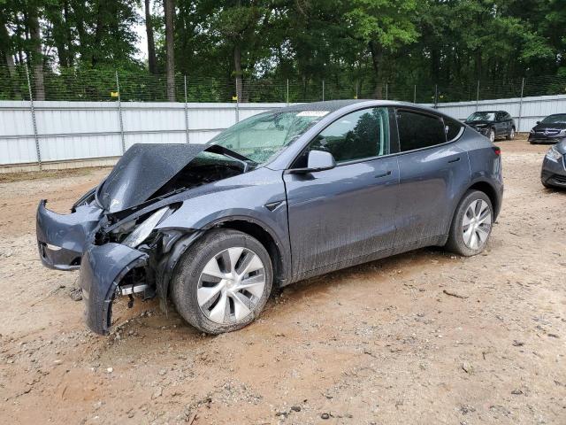 TESLA MODEL Y 2023 with VIN 7SAYGDEE6PA038113 - Photo from auction