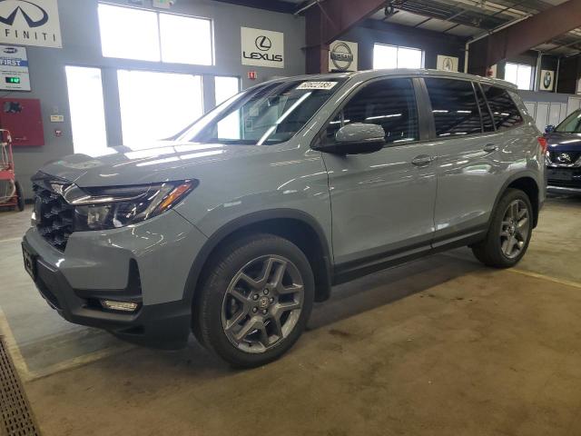 HONDA PASSPORT E 2022 with VIN 5FNYF8H59NB000975 - Photo from auction