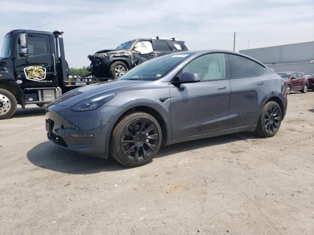 TESLA MODEL Y 2023 with VIN 7SAYGAEE8PF766761 - Photo from auction