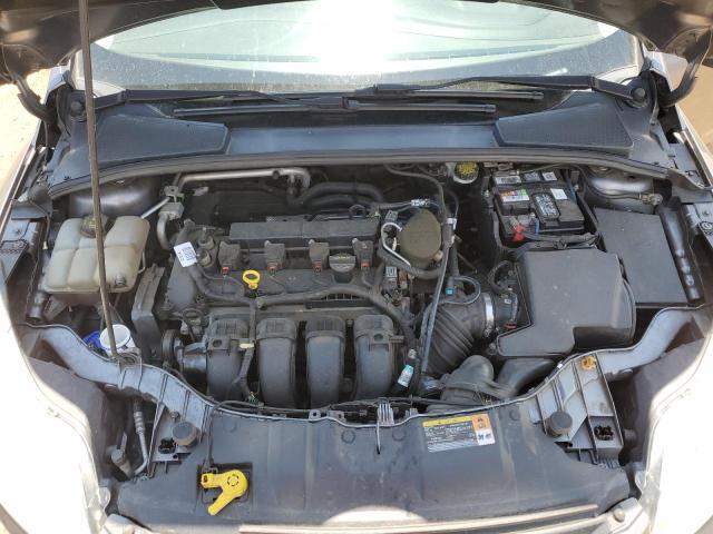 Photo 11 from auction – 2014 FORD FOCUS SE with VIN 1FADP3F21EL135829