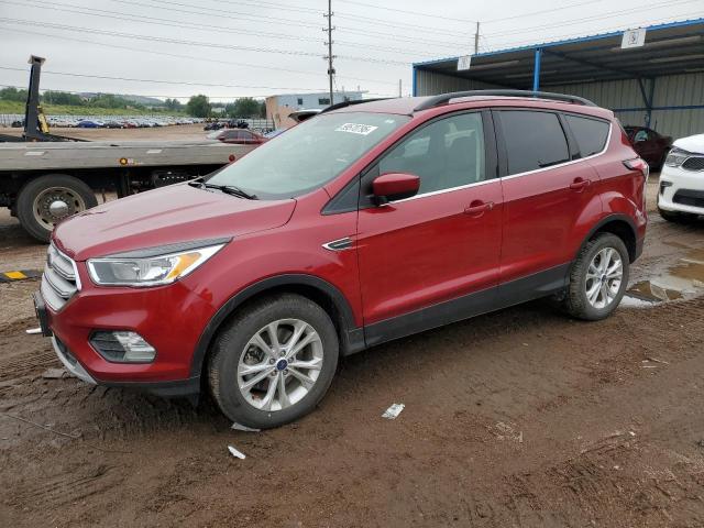 FORD ESCAPE SE 2018 with VIN 1FMCU9GD4JUC70420 - Photo from auction