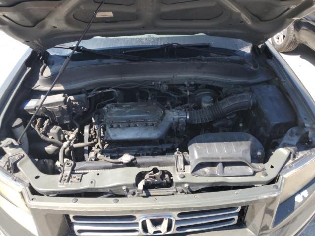 Photo 11 from auction – 2007 HONDA RIDGELINE with VIN 2HJYK16557H504342