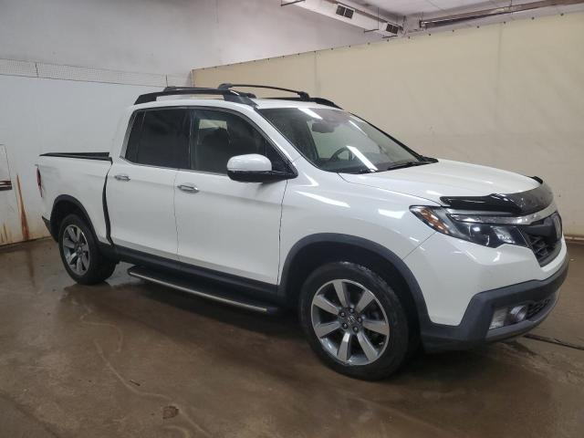 Photo 4 from auction – 2018 HONDA RIDGELINE with VIN 5FPYK3F74JB001049