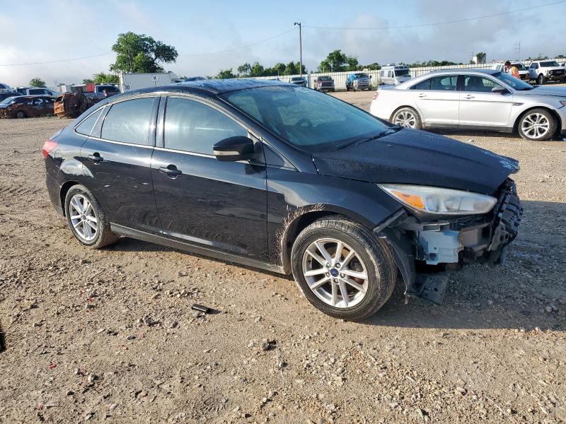 Photo 4 from auction – 2016 FORD FOCUS SE with VIN 1FADP3F21GL299780