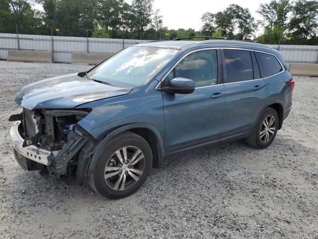 HONDA PILOT EXL 2018 with VIN 5FNYF5H59JB018711 - Photo from auction