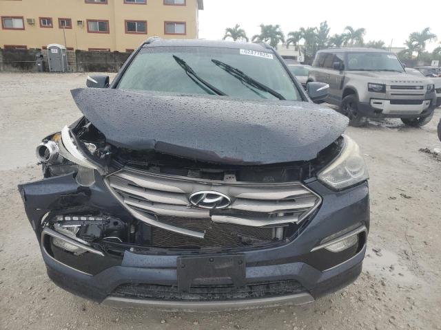 Photo 5 from auction – 2018 HYUNDAI SANTA FE S with VIN 5NMZU3LB3JH062830
