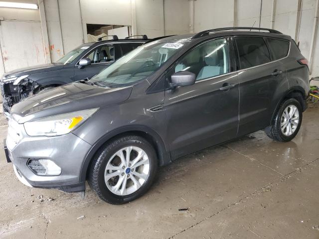 FORD ESCAPE SE 2018 with VIN 1FMCU0GD4JUB38141 - Photo from auction