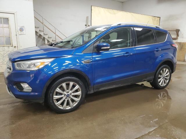 FORD ESCAPE TIT 2017 with VIN 1FMCU9J93HUE71160 - Photo from auction