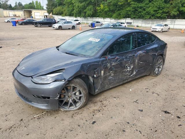 TESLA MODEL 3 2022 with VIN 5YJ3E1EB9NF317525 - Photo from auction