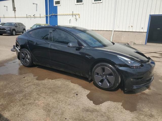 Photo 4 from auction – 2023 TESLA MODEL 3 with VIN LRW3E1FA8PC945112