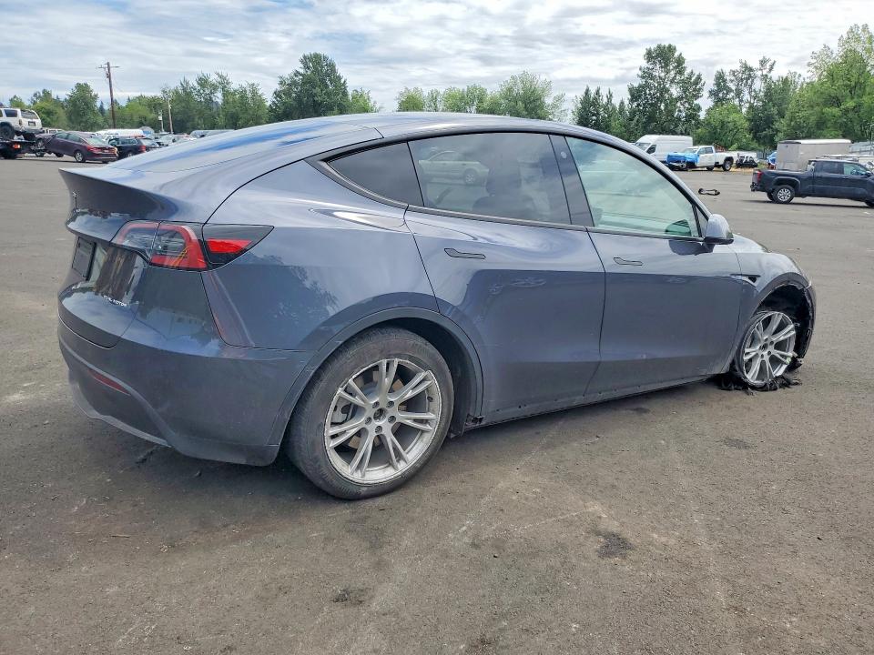 Photo 3 from auction – 2023 TESLA MODEL Y with VIN 7SAYGAEE0PF596752