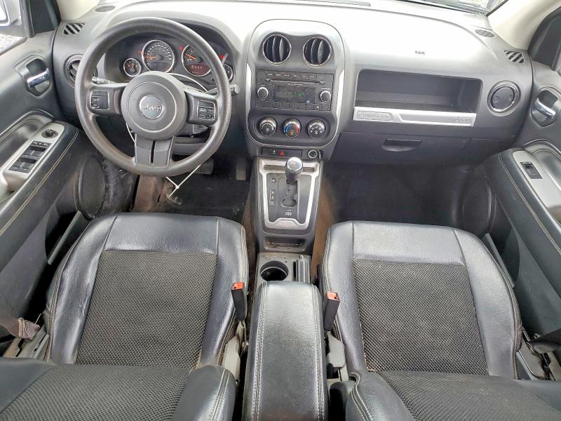 Photo 8 from auction – 2014 JEEP COMPASS with VIN 1C4NJDABXED566029