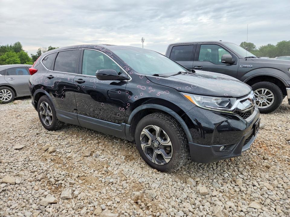 Photo 4 from auction – 2018 HONDA CR-V with VIN 7FARW2H56JE000822