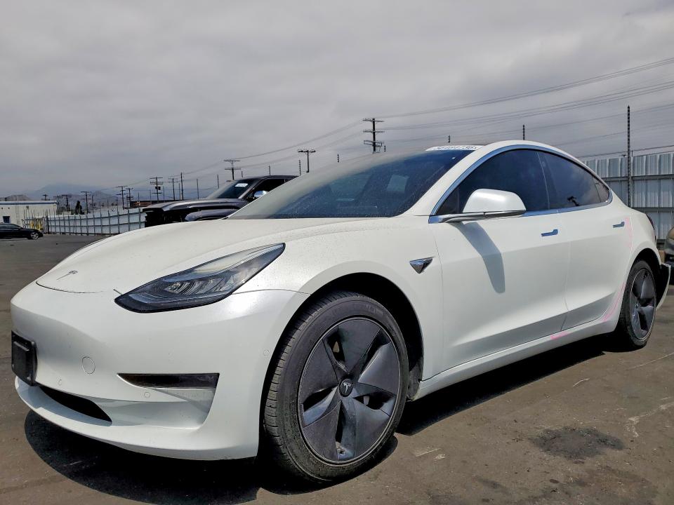 TESLA MODEL 3 2017 with VIN 5YJ3E1EA2HF003128 - Photo from auction