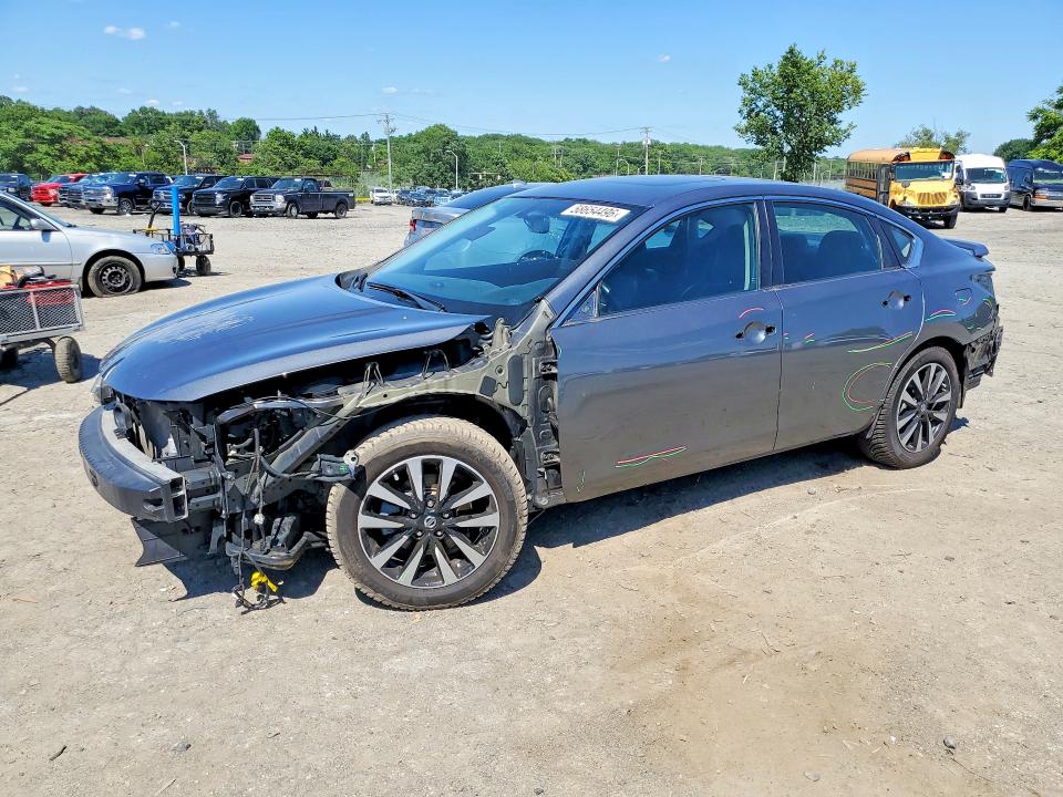 NISSAN ALTIMA 2018 with VIN 1N4AL3AP0JC213609 - Photo from auction
