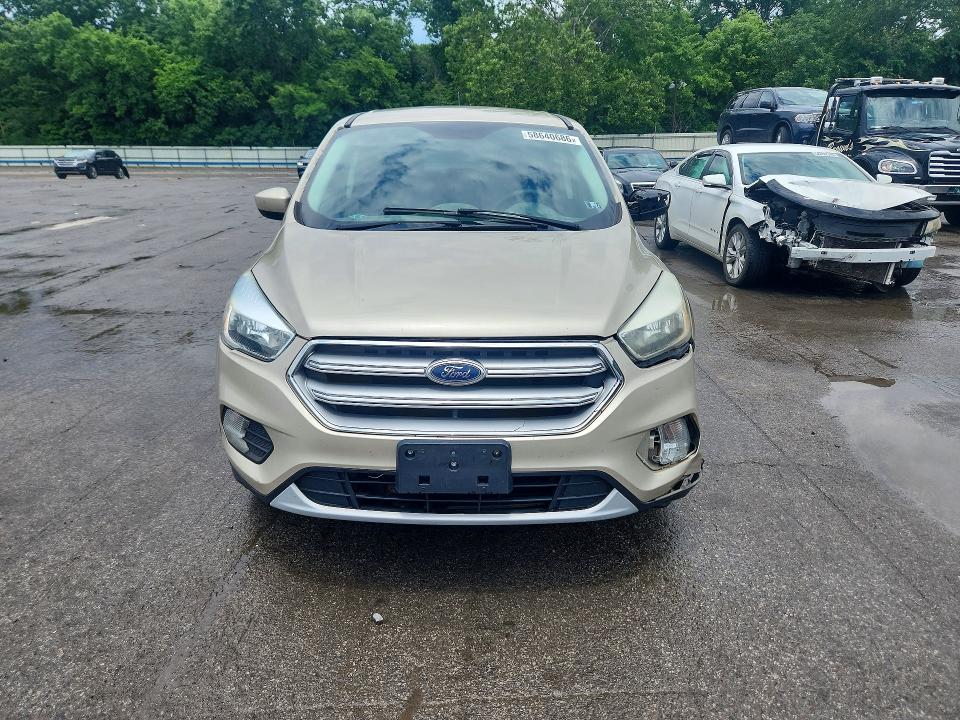 Photo 5 from auction – 2017 FORD ESCAPE with VIN 1FMCU9GD4HUC08588